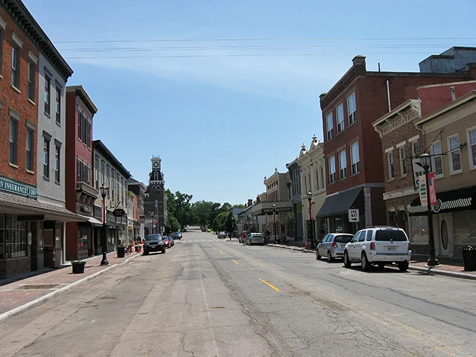 Historic main street in a small Ohio village, with brick storefronts and a clock tower